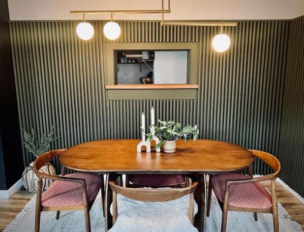 The fluted walled dining room is the first thing you see as you enter the home.