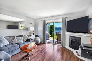 Lake views from the living room, and access to the patio.