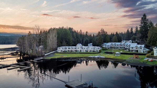 Sunset view of the Shawnigan Beach Resort from the water.