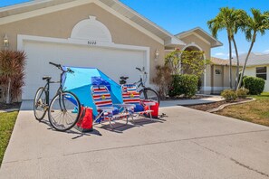 "Pack light, play big! Leave the gear at home and dive into our array of complimentary amenities - bikes, beach chairs, and umbrellas await your seaside adventures.
