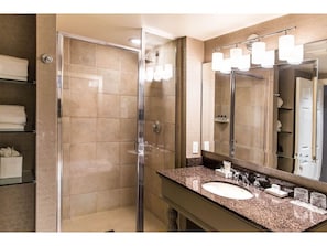 A well-lit bathroom with elegant fixtures offers a serene environment for a rejuvenating routine.