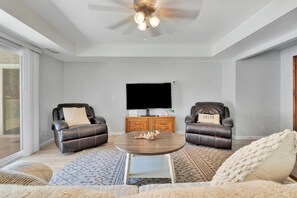 Smart TV and comfy recliners.