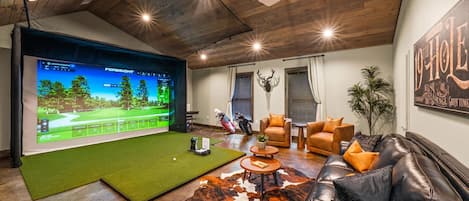 Try out your swing in the Golf Simulator Room