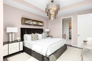 Primary suite with a king bed and a 55" 4K UHD TV