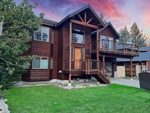 Front entrance & 2 car garage with large driveway