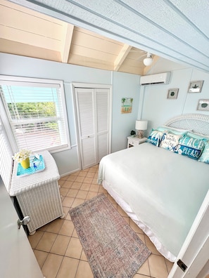 Freshly painted main bedroom with Queen bed