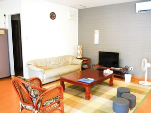 ・"Annex" living room: Air conditioning and electric fans are provided for your comfort.