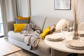living room with TV and a place to relax