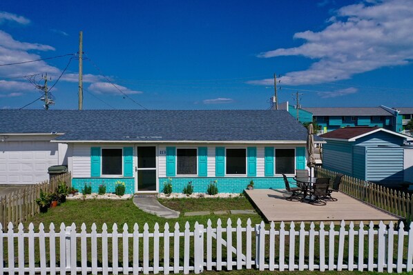 This cute bungalow is located 1 block from the beach and Kure Pier!