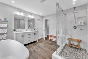 The large main floor common bathroom is like a spa experience.