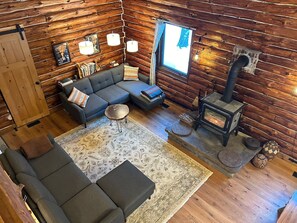 Living area and woodstove from loft
