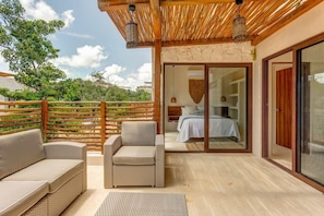 The outdoor space has comfortable seating