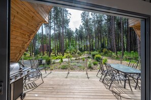 Outside entertaining space with views to woodland beyond