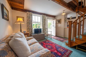 A stable door leads you into the sitting room