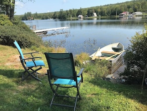 Lakefront access includes dock, room for a couple chairs.