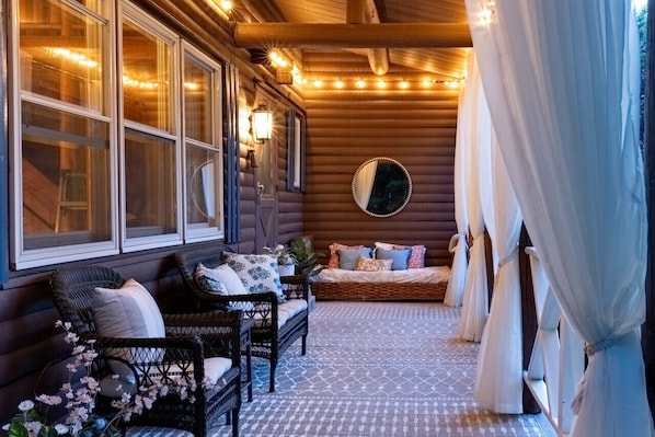The charming front porch is perfect for relaxing.