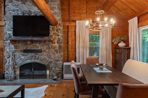 The large TV with a sound bar is perfect for watching movies after a long day exploring Lake Winnipesaukee, skiing at Gunstock or hiking.