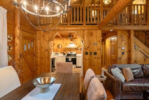 The open dining area is adjacent to the kitchen, perfect for socializing during meals.