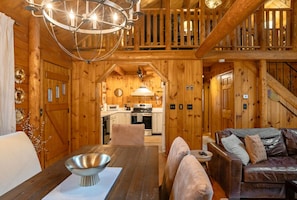 The open dining area is adjacent to the kitchen, perfect for socializing during meals.