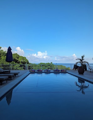 Salt water swimming pool with outdoor shower and one full bathroom