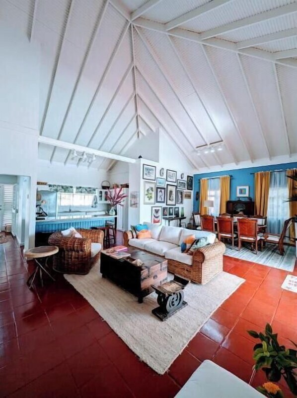 Spacious indoors. Open kitchen. Dining and sitting rooms. Vaulted ceilings