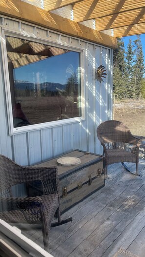 Northeast deck for morning coffee and evenings by the hippie stove