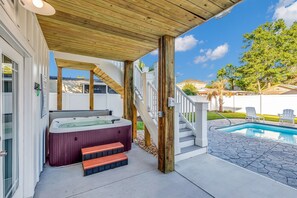 Relax in the hot tub while the kids play in the pool!