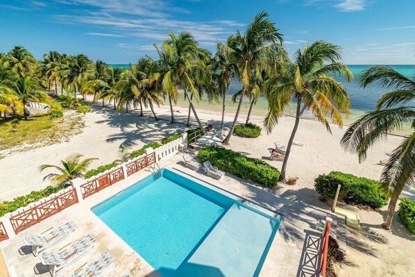 Balcony view of pool & sea!