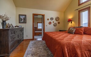 Main bedroom features a king size bed