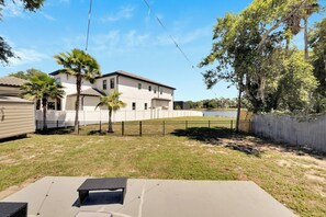 Back Yard w/ gate to go to lake area