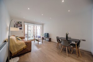 Dining area open plan to kitchen and lounge.