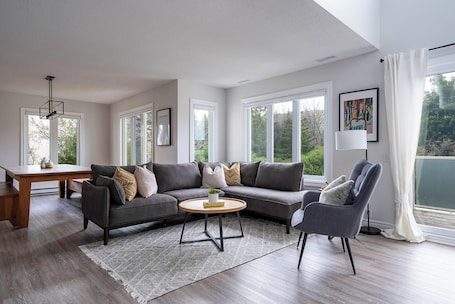 Bright and Spacious Living Room with views of Blue Mountain