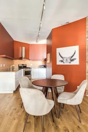 Living Room / Dining Room Combo with Fully stocked kitchen