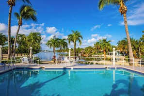 Communal pool overlooks Cayman Kai cove. 