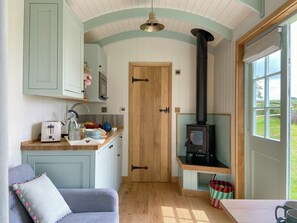 Open plan living space | The Good Shepherd Hut, Froxfield, near Petersfield