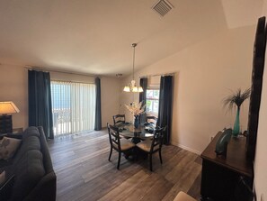 Dining Room and Foyer
Slider access to Patio with table and chairs
