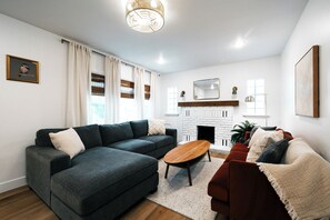 Living room - plenty of comfortable seating for family and friends