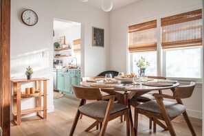 Share sunlit meals and laughter in this cozy, stylish dining nook.
