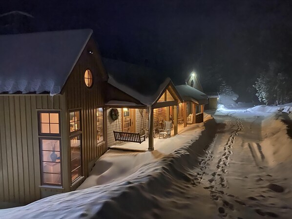 Winter wonderland facing woods.