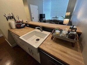 Refresh and rejuvenate at the sleek sink area, where modern design meets functionality for your daily rituals.