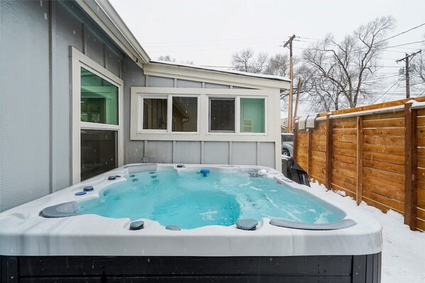 Take a dip in our heated hot tub and let your worries melt away under the starlit sky.