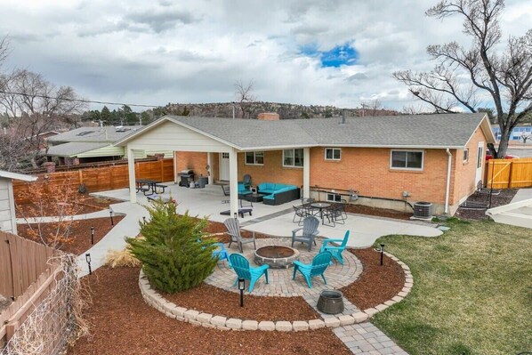 This panoramic shot showcases the full splendor of our backyard retreat, where every corner is designed for relaxation and enjoyment.