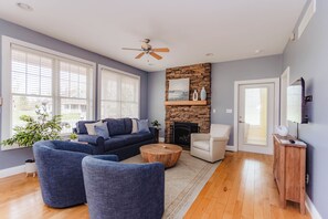 Smart TV, soft seating, and space to unwind