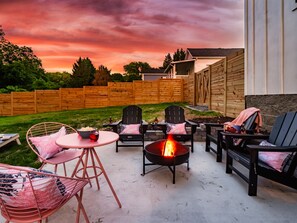 Cozy evenings by the fire pit in a picturesque backyard