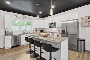 Cook with Hexclad cookware in our brand new kitchen