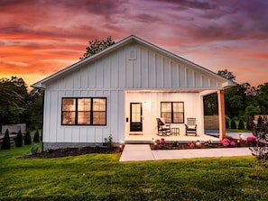Enjoy Southern charm while relaxing on the porch