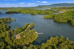 Embrace the peace and serenity of this idyllic mountain and lake retreat, where every moment is a picture-perfect escape.