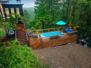 This 8x20 Container Pool has a surrounding deck, shallow sun shelf, and fun swim area with more amazing views of the Kiamichi Mountains.