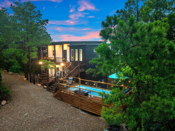 IN HIGH SPIRITS is a mountaintop cabin with incredible mountain views, POOL, Hot tub, Sauna, and Cold Plunge!