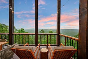 It just doesn't get much better than enjoying some quiet time in a rocky chair overlooking the mountains and forest
